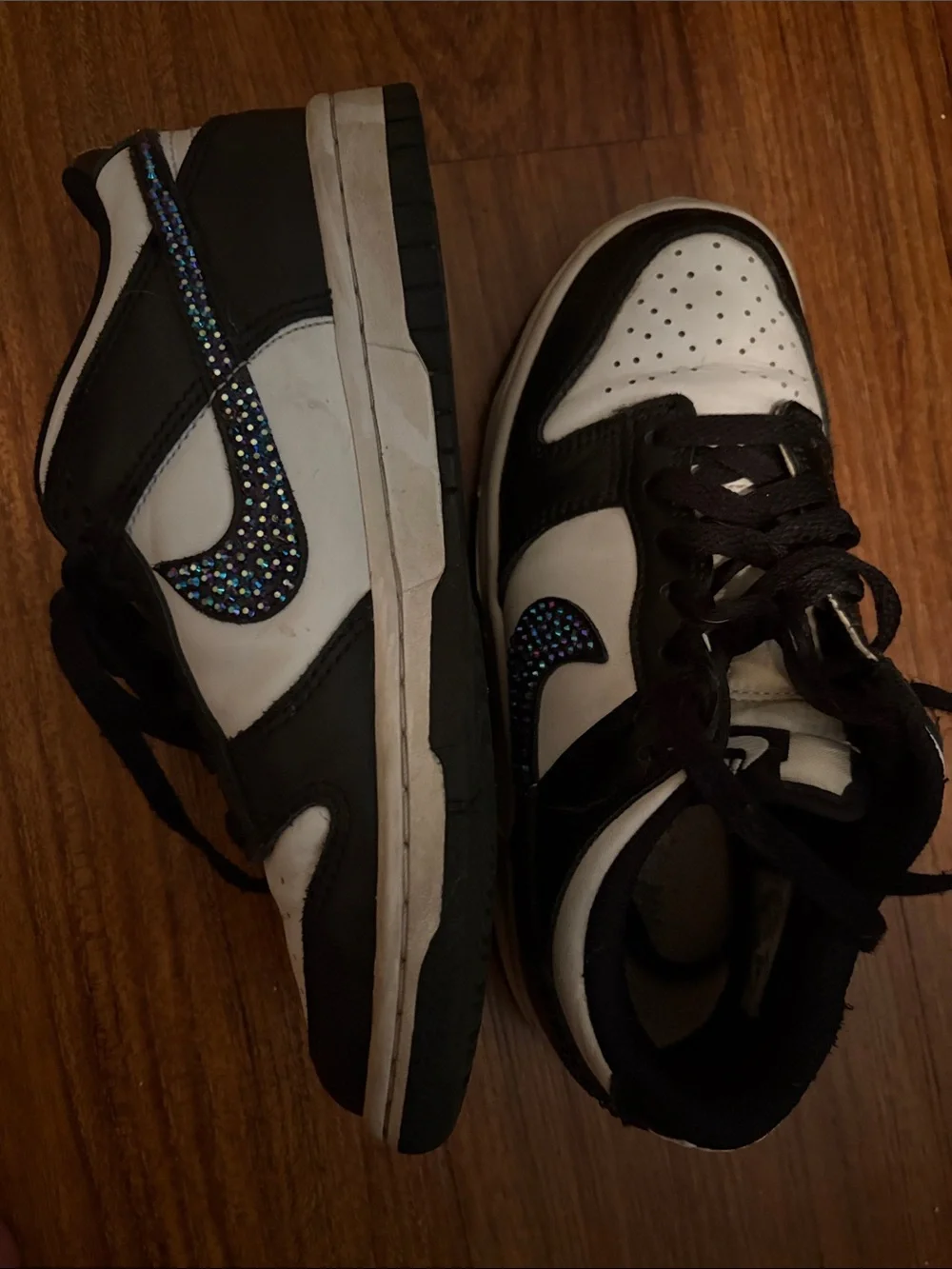 Nike Black and White Low-Top Sneakers with Iridescent Swoosh